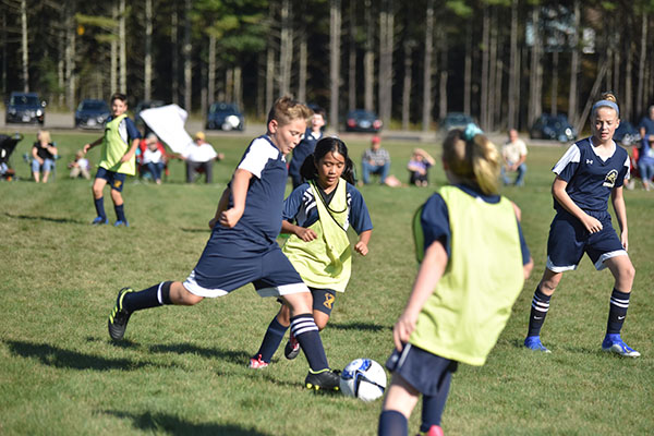 beatrice playing soccer for st. Josephs image