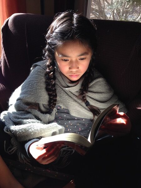 Beatrice Reading on Couch